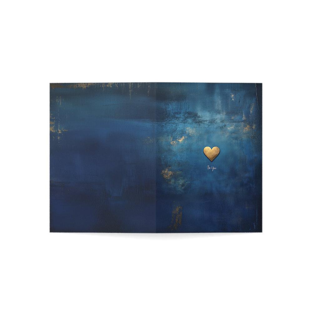 Minimalist greeting card with a golden heart on a deep blue background